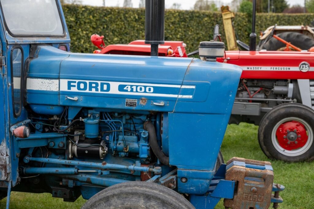 Restored blue Ford 4100 tractor on display outside Springfields, Spalding