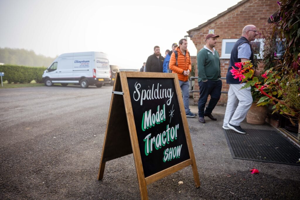 Chalkboard sign at the entrance to the Spalding Model Tractor Show as visitors arrive