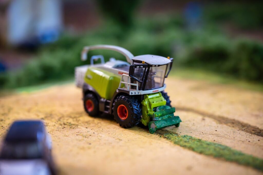 Close-up of a green Claas forage harvester model on a diorama at the Spalding Model Tractor Show