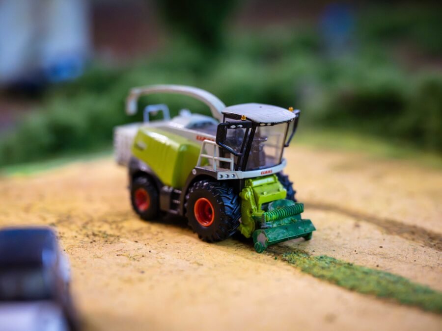 Close-up of a green Claas forage harvester model on a diorama at the Spalding Model Tractor Show